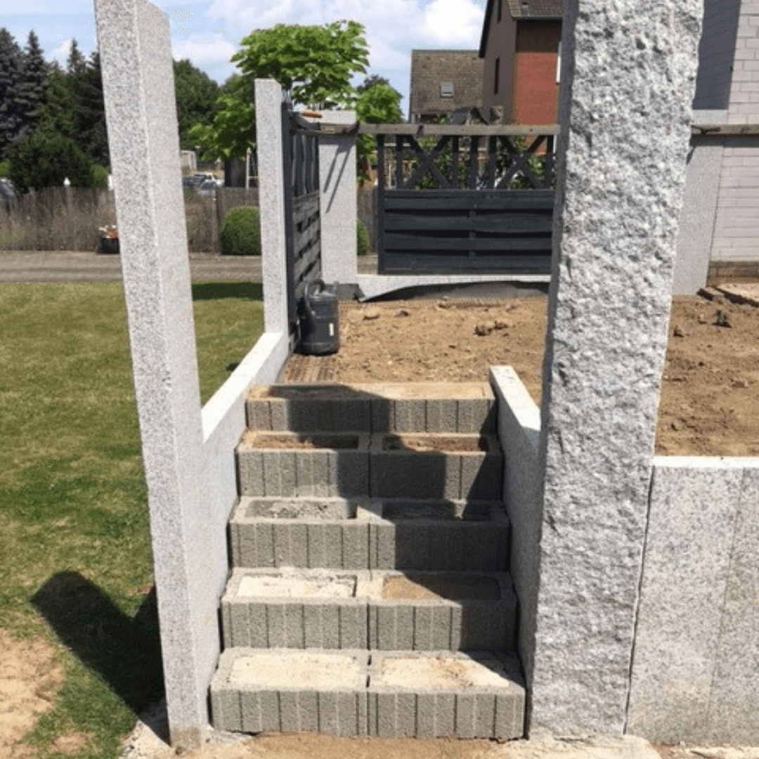 Terrassensanierung mit Granit und Wänden aus Kunststoffplatten
